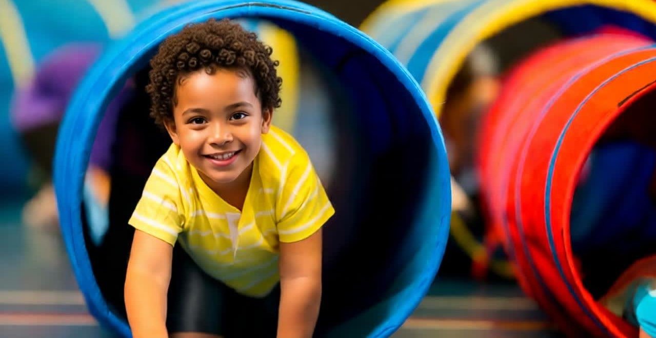 Child smiling during a sensory play activity